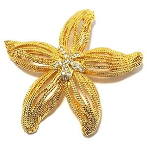KENNETH JAY LANE, SATIN GOLD STARFISH PIN WITH CRY